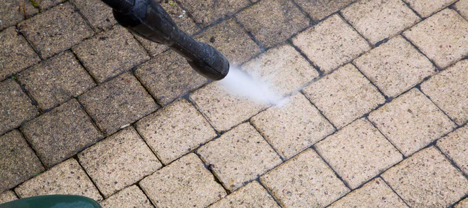 Pressurewashing brick walkway